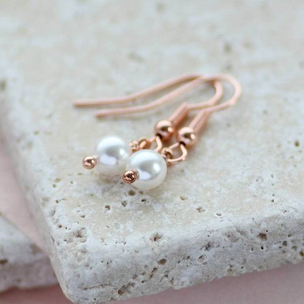 Image shows Rose Gold Swarovski Pearl Earrings