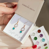 Image shows model holding Rose Gold Circle Birthstone Earrings in a gift box on a gift for you sentiment card