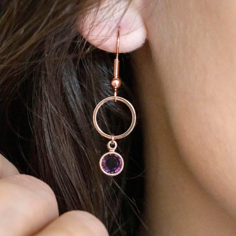 Image shows model wearing Rose Gold Circle Birthstone Earrings
