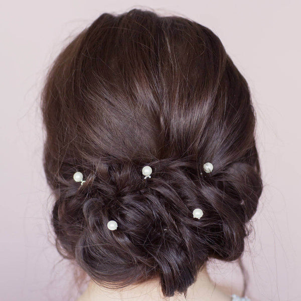 Image shows model wearing Set of Five Pearl Wedding Hairpins