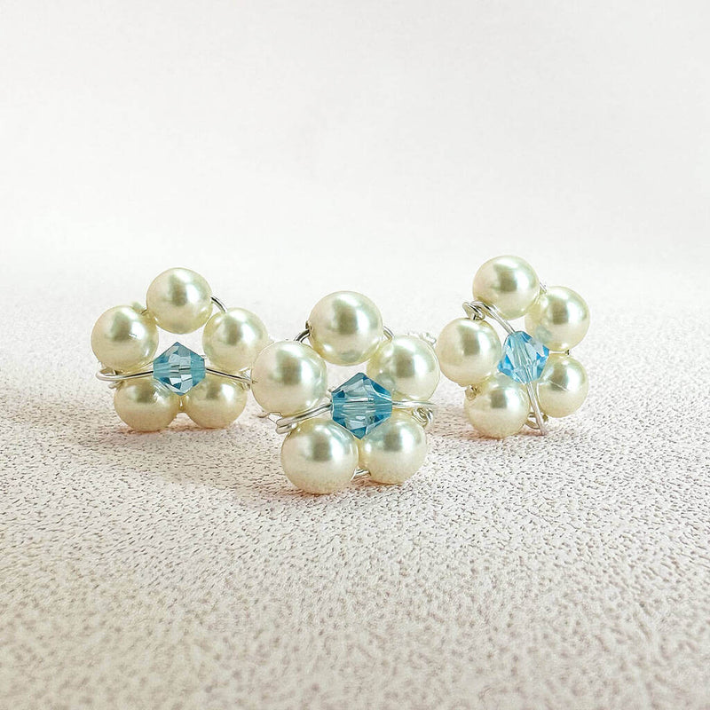 Image shows set of three something blue pearl flower bouquet pins