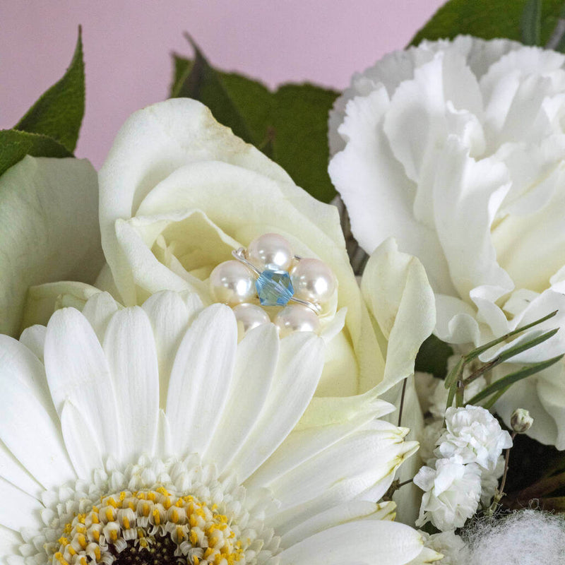 Image shows wedding flowers with something blue pearl flower bouquet pin
