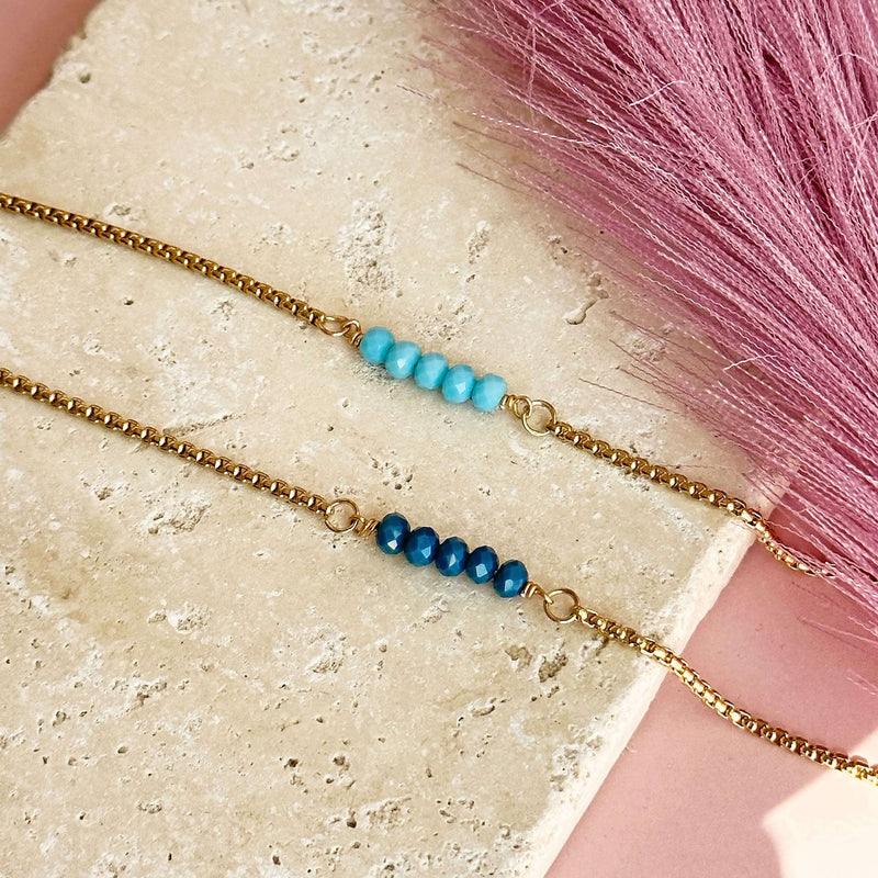 Image shows Set of Two Beaded Bracelets - Blue Shades