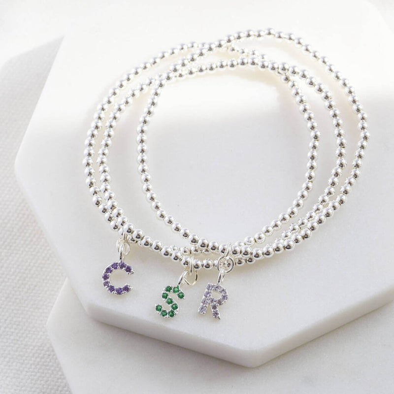 Image shows 3 Silver Plated Beaded Bracelet With Birthstone Initial