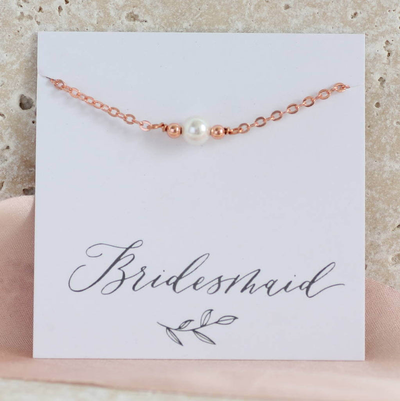 Image shows single Swarovski pearl beaded bracelet on bridesmaid sentiment card