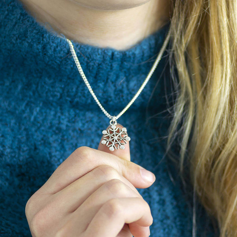 Image shows model wearing Snowflake Necklace 