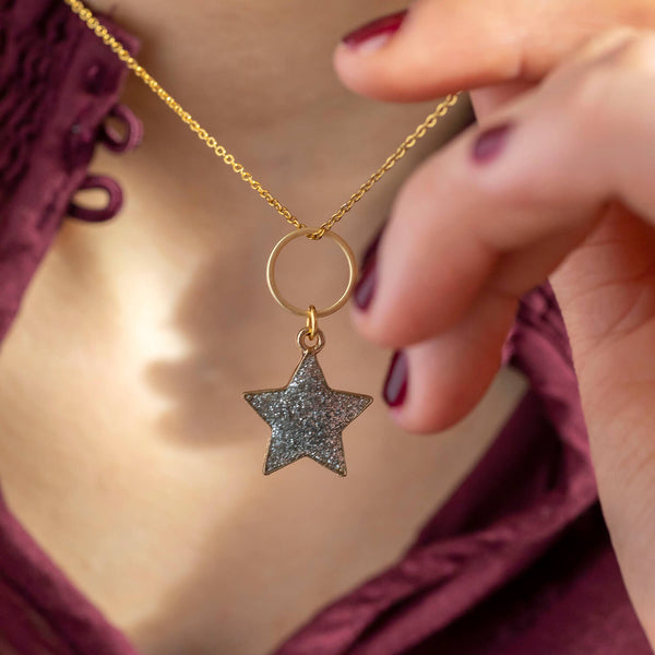 Image shows model wearing Sparkle Star Circle Charm Necklace