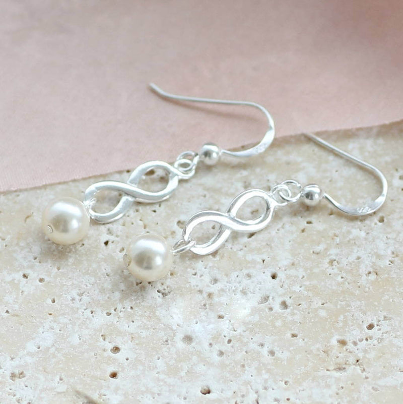 Image shows Sterling Silver Infinity Pearl Earrings