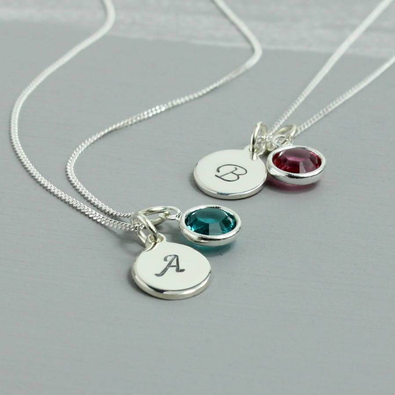 Image shows two sterling silver personalised birthstone necklaces
