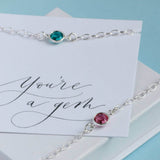 Image shows two Sterling Silver Swarovski Crystal Birthstone Bracelets on a you're a gem sentiment card
