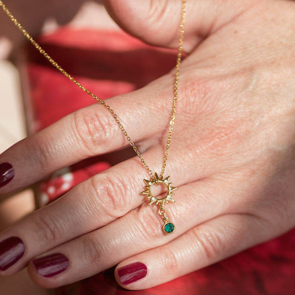 Image shows gold Sunburst Necklace With White Opal And May Birthstone Detail