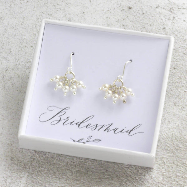 Image shows  a gift box with Swarovski Pearl Cluster Charm Earrings on a Bridesmaid sentiment card