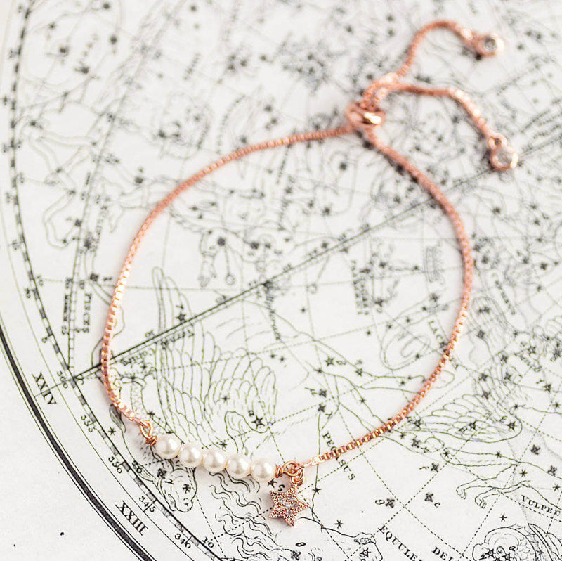 Image shows rose gold Swarovski Pearl Slider Charm Bracelet