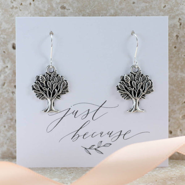 Image shows Tree of Life Earrings on a Just because sentiment card