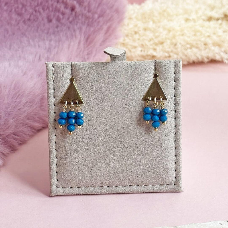 Image shows Triangle Studs with Turquoise Bead Drop Detail
