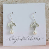 Image shows Triple Leaf Pearl Drop Earrings on a Congratulations sentiment card