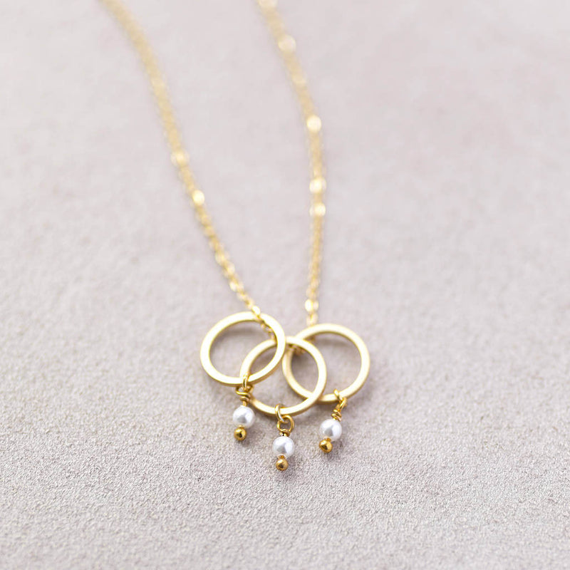 Image shows Triple Pearl Drop Circle Charm Necklace