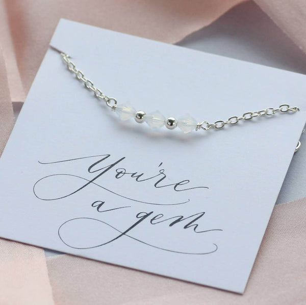 Image shows silver White Opal Swarovski Crystal Bar Bracelet on a you're a gem sentiment card