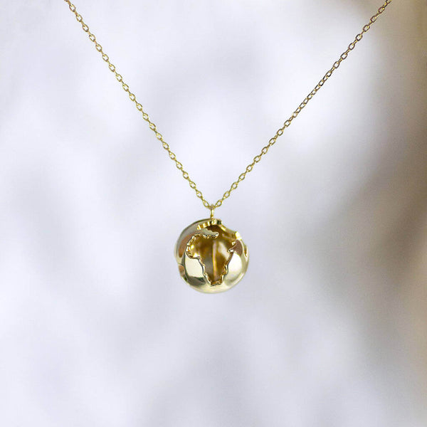 Image shows gold You Are My World Globe Necklace