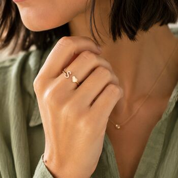 Silver adjustable initial ring with crystal S and heart charm, a delicate personalised jewellery piece for layering