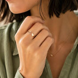 Silver adjustable initial ring with crystal S and heart charm, a delicate personalised jewellery piece for layering
