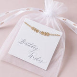 Gold plated vine birthstone bracelet on a 'Beautiful Wishes' card in a soft organza gift bag with branded ribbon detail
