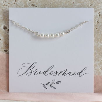 Sterling silver Swarovski pearl bracelet on a Bridesmaid sentiment card, timeless jewellery with elegant pearl details.