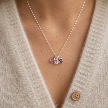 Silver family birthstone charm pendant with lilac crystal charms, delicate jewellery for everyday layering.