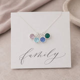 Silver family birthstone charm pendant on a Family keepsake card, colourful personalised jewellery for everyday wear.
