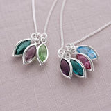 Silver marquise birthstone charm necklaces with colourful crystal details, timeless jewellery for layering.