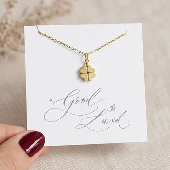 Gold plated clover charm necklace displayed on a Good Luck card, elegant everyday jewellery with a lucky touch.