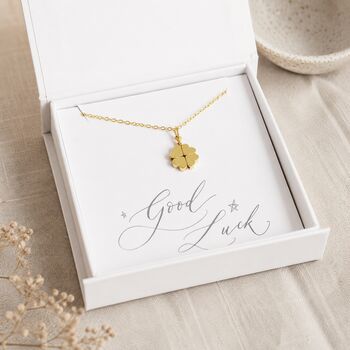 Gold plated clover necklace in a gift box with a Good Luck card, timeless jewellery for everyday wear.
