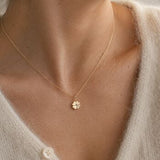 Gold plated four leaf clover necklace with a polished charm, timeless layering jewellery for everyday style.