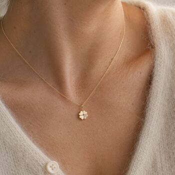 Gold plated four leaf clover necklace with a polished charm, timeless layering jewellery for everyday style.