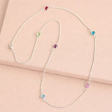 Silver long birthstone necklace with colourful crystal accents, delicate personalised jewellery for effortless layering.