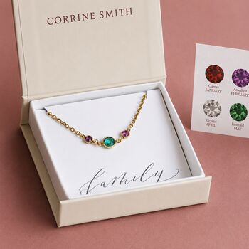 Gold plated birthstone bracelet with three colourful crystal charms in a JOY gift box, perfect for layered styling.