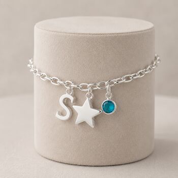 Silver charm bracelet with letter S, star pendant and aqua birthstone crystal for everyday wear