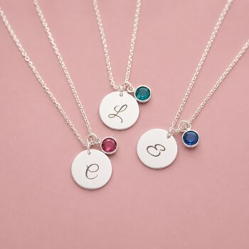 Silver plated initial disc necklaces with colourful birthstone charms, perfect for layering or everyday personalised style
