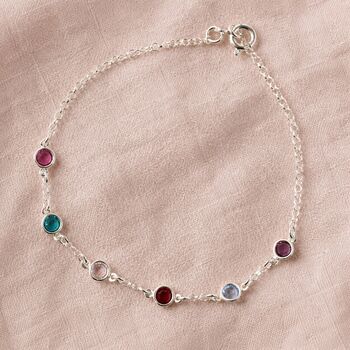 Sterling silver birthstone bracelet with colourful crystal accents, elegant personalised jewellery for layering.