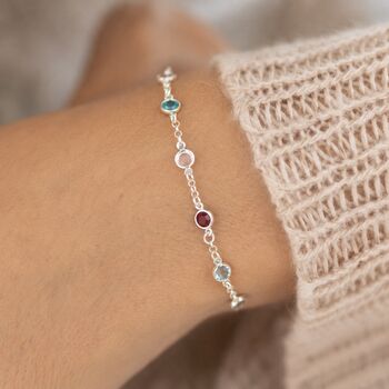Sterling silver mini birthstone bracelet with colourful crystal details, minimalist jewellery for effortless layering.