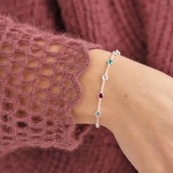 Sterling silver mini birthstone bracelet with colourful crystal details, delicate stacking jewellery for everyday wear.