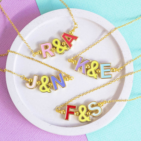 Image shows Best Friends Necklace with Enamel Initials from top: "R&A", "K&E", "J&N" and "F&S".