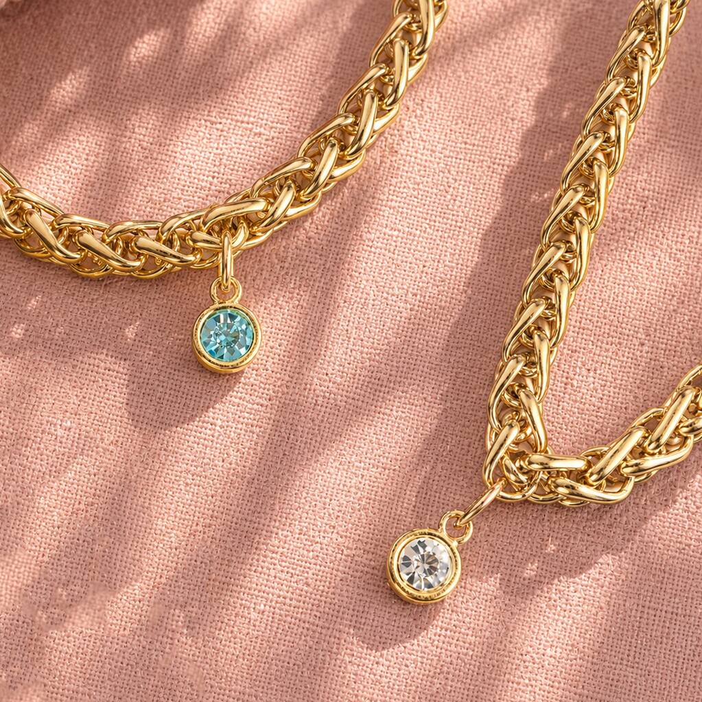 Gold plated rope chain bracelets with colourful birthstone charms, statement jewellery for stacking and layering.
