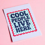 Retro style wall art print with Cool People Live Here message and green star pattern