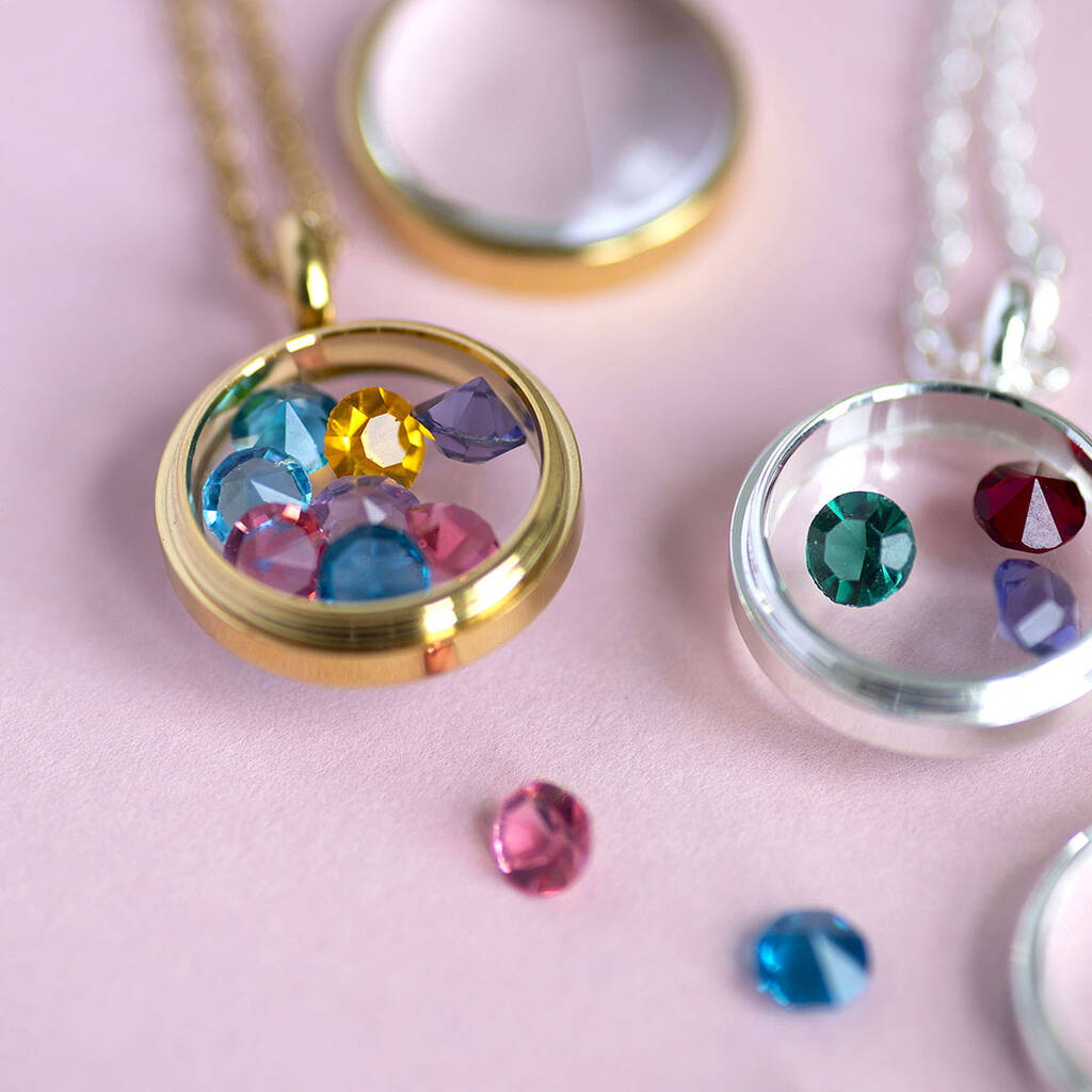Personalised family birthstone locket necklace featuring custom birthstones for each loved one. Available in silver or gold.