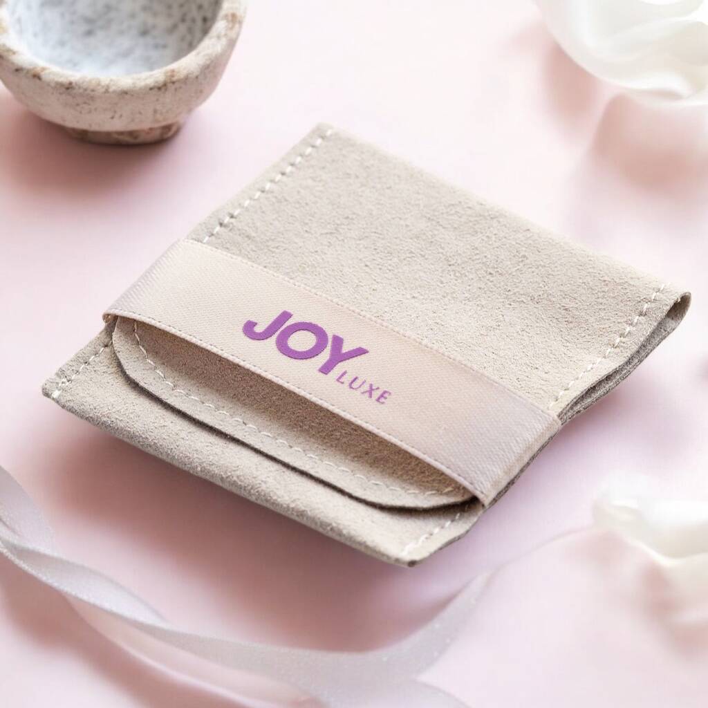 JOY by Corrine Smith suedette grey jewellery pouch.