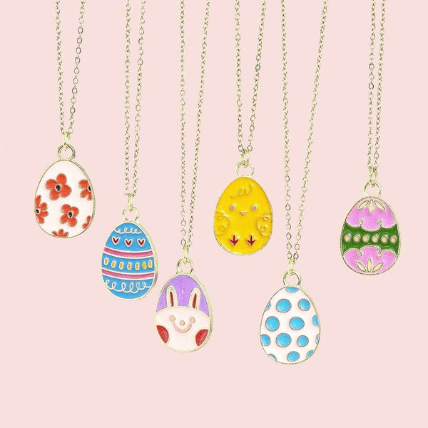 Display of 5 different designs of enamel easter egg charm gold plated necklaces