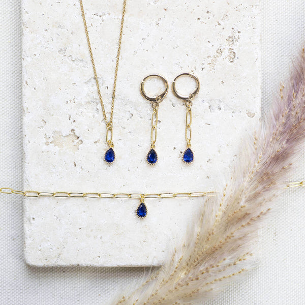 Image shows Dainty Teardrop Birthstone Jewellery Set in September Sapphire.
