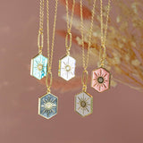 Image shows Enamel Hexagon Star Necklace in five available colours from left to right: turquoise, black, purple, white and pink.