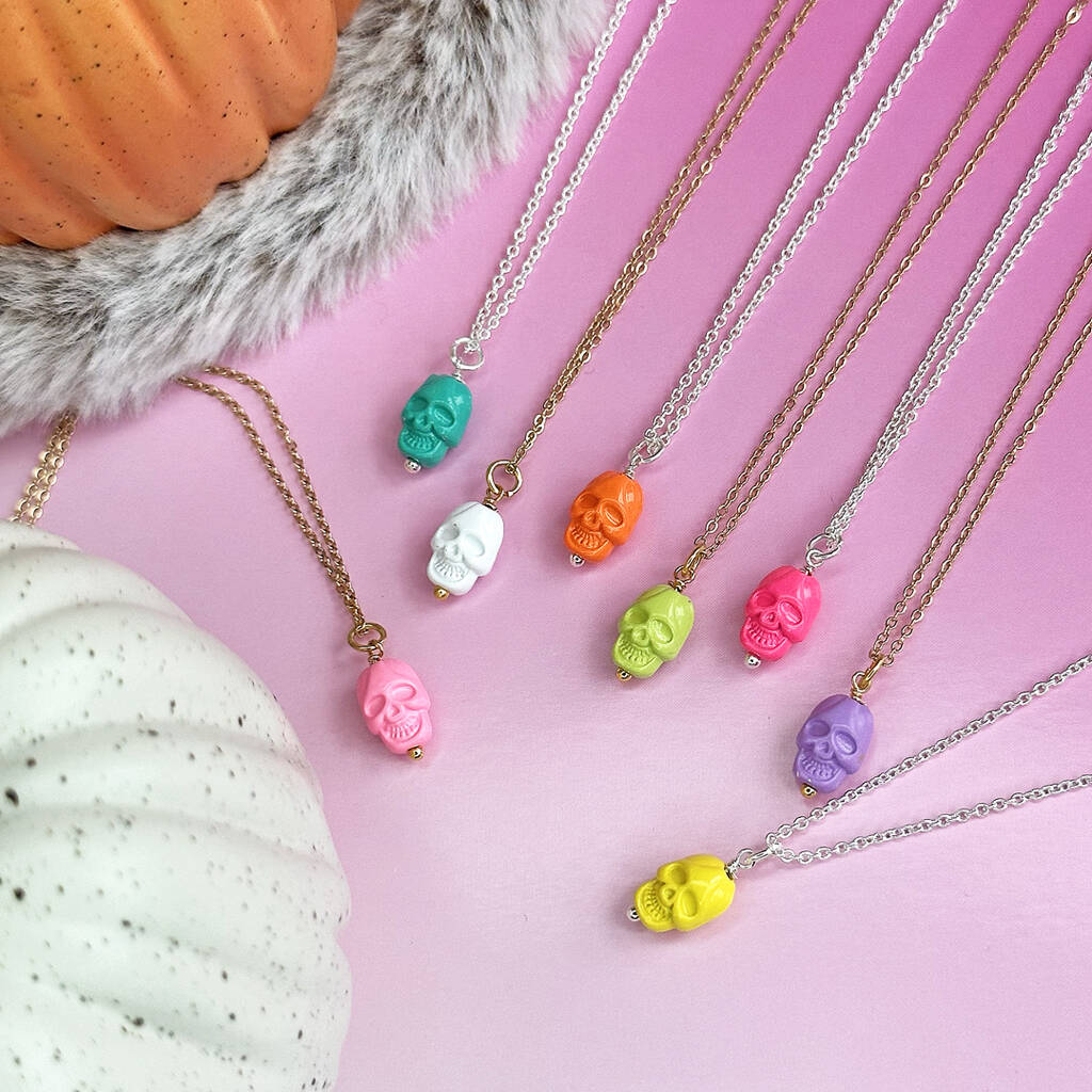 Enamel skull necklaces in bright colours